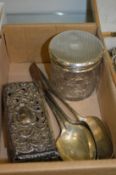 Four silver spoons, a dressing table jar and a box.