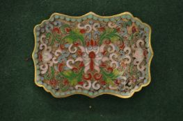 A Chinese enamel belt buckle.