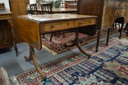 A 19th century mahogany sofa table with draws to each side (top split).