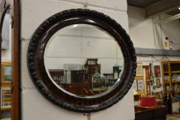An oval mirror.