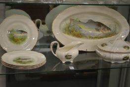 A fish decorated part dinner service.