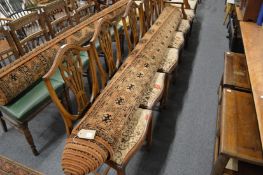 A modern large Bokhara style beige ground carpet, approximately 3.5m x 2.5m.