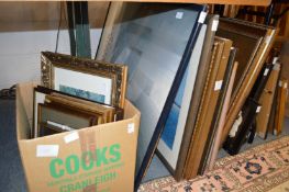 A group of paintings and prints.