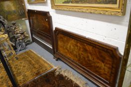 A mahogany headboard and foot board.