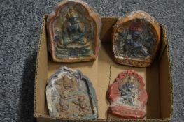 Four Tibetan pottery small moulded panels.