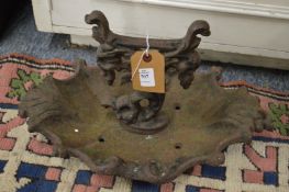 An old cast iron boot scraper.