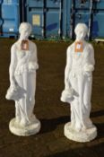 A pair of painted composite classical garden figurines.