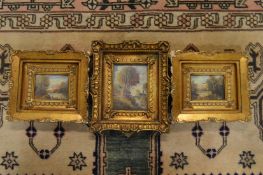 Three small gilt framed oil paintings.