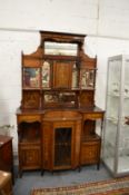 A good Victorian rosewood and marquetry inlaid mirror back cabinet.