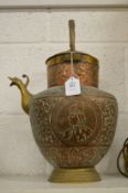 An eastern copper and brass ewer.