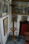 An Edwardian mahogany hat stand.