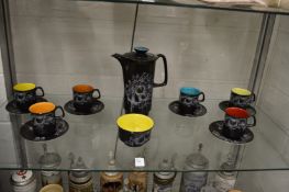 A Crown Devon Harlequin coffee service.