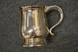 A good heavy silver baluster shaped tankard.