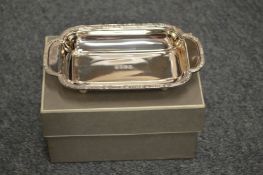 A small silver dish with original retailer's box.
