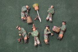 Miniature wooden figures.