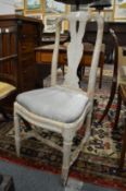 A Swedish painted beech dining chair.