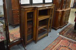 A mahogany breakfront low bookcase.