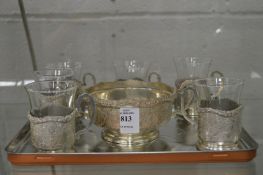 A set of six eastern white metal cups and a similar bow.