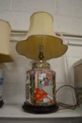 A large Chinese pottery table lamp.
