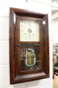 A 19th century mahogany cased American wall clock.