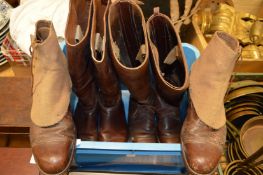 Three pairs of leather boots.