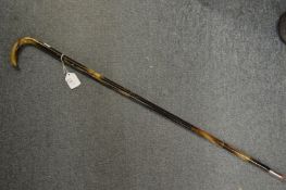A sectional horn walking stick.