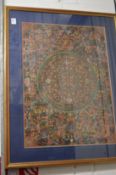A large Indian Thangka, framed and glazed.