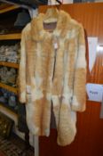 A ladies' fur coat.
