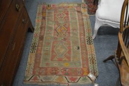 An old Kilim rug.