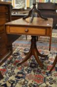 A 19th century mahogany pedestal Pembroke table.