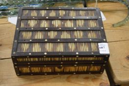 A porcupine quill box.