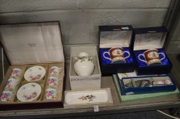 Decorative boxed china to include an Aynsley set of six coffee cups and saucers.