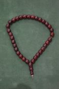 A simulated amber bead necklace.