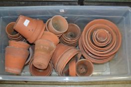A quantity of terracotta plant pots.