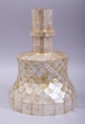 AN IMPRESSIVE INDIAN GOA MOTHER OF PEARL SCALE CANDLESTICK, onlaid all over with cut mother of pearl