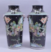 A PAIR OF CHINESE KANGXI STYLE FAMILLE NOIR / VERTE PORCELAIN VASES, the body of each decorated with