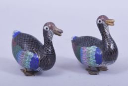 A SMALL PAIR OF CHINESE CLOISONNE DUCKS, each approx 7cm wide.