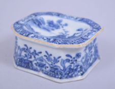 AN 18TH CENTURY QIANLONG PERIOD BLUE AND WHITE SALT, with landscape scenes and floral decoration,