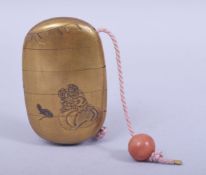 A JAPANESE GILT LACQUER FOUR CASE INRO, depicting daikoku and rat, with a coral colour glass ojime