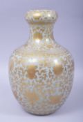 A GOOD CHINESE CELADON GLAZE AND GILT DECORATED GARLIC HEAD VASE, the body painted all over with