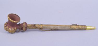 A 19TH CENTURY TURKISH TOPHANE CERAMIC AND GILT METAL PIPE, with gilt metal mounts and enamel