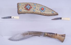 A 19TH CENTURY ISLAMIC RHINO HORN HANDLED DAGGER, the sheath with gilt metal mounts inset with