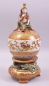 A JAPANESE KUTANI PORCELAIN KORO AND GLOBULAR COVER, the cover painted in the typical kutani palette
