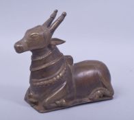 A LARGE 19TH CENTURY INDIAN BRASS NANDI BULL, 19cm wide.