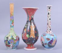 THREE ISLAMIC PORCELAIN VASES, two depicting figures, one with boats (3).