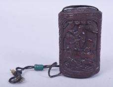 A JAPANESE CARVED WOOD FOUR CASE INRO, carved with a panel of a figure on horseback, 8.5cm.