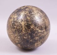 AN INDO-PERSIAN HEAVY BRASS CELESTIAL GLOBE, the spherical form with engraved markings, characters