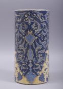 A TURKISH IZNIK ALBERELLO, decorated with foliate motifs, 22.5cm high.