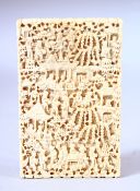 A GOOD CHINESE CANTON CARVED IVORY CARD CASE, carved with figures in a busy landscape, 10.5cm x 6.