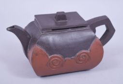 A CHINESE TWO TONE YIXING CLAY TEAPOT AND COVER of rectangular form, mark to base and underside of